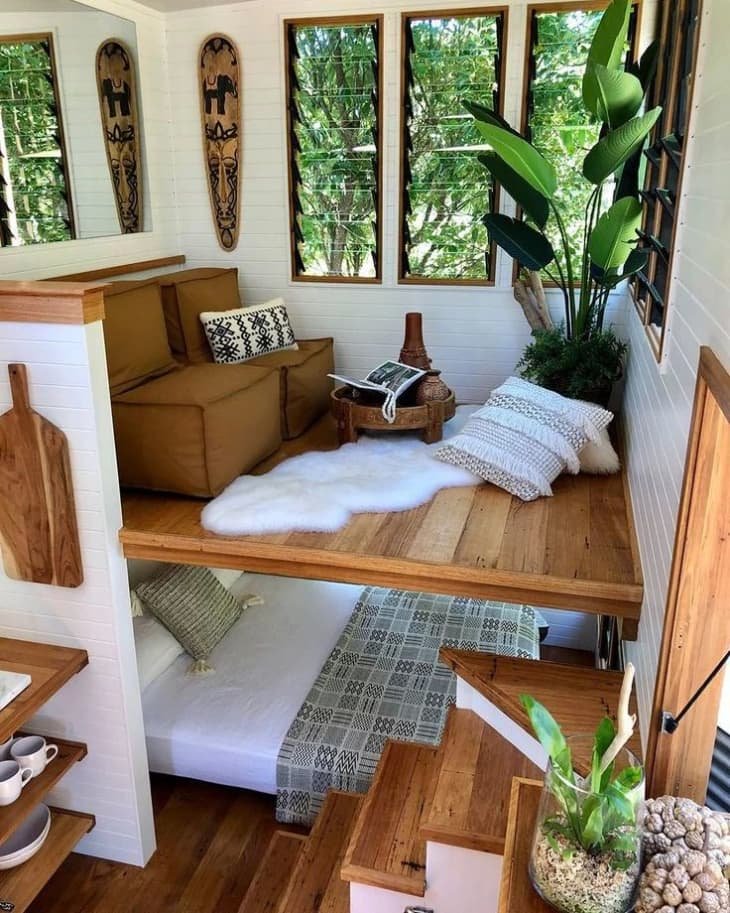 A tiny house interior showcasing comfortable and well-designed furniture arrangements