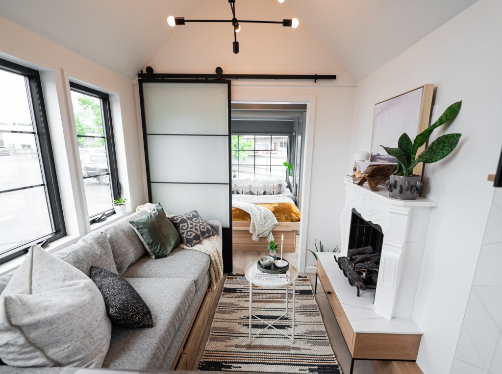 A tiny house interior with a modern minimalist design.